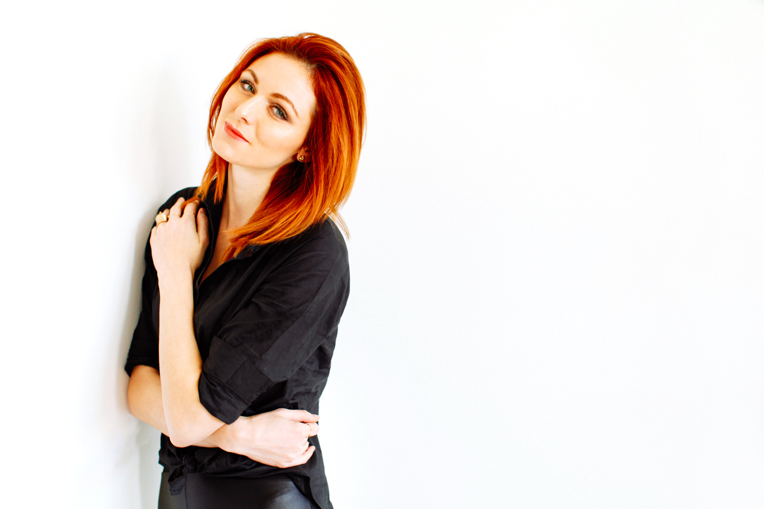 Black shirt and red hair