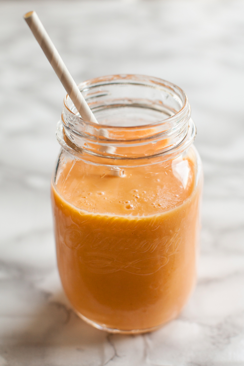 Carrot Mango Smoothie Recipe featured by top US food blog, Tea Cups & Tulips