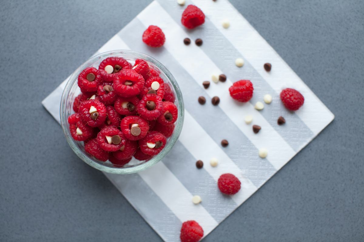 Raspberries filled with dark and white chocolate