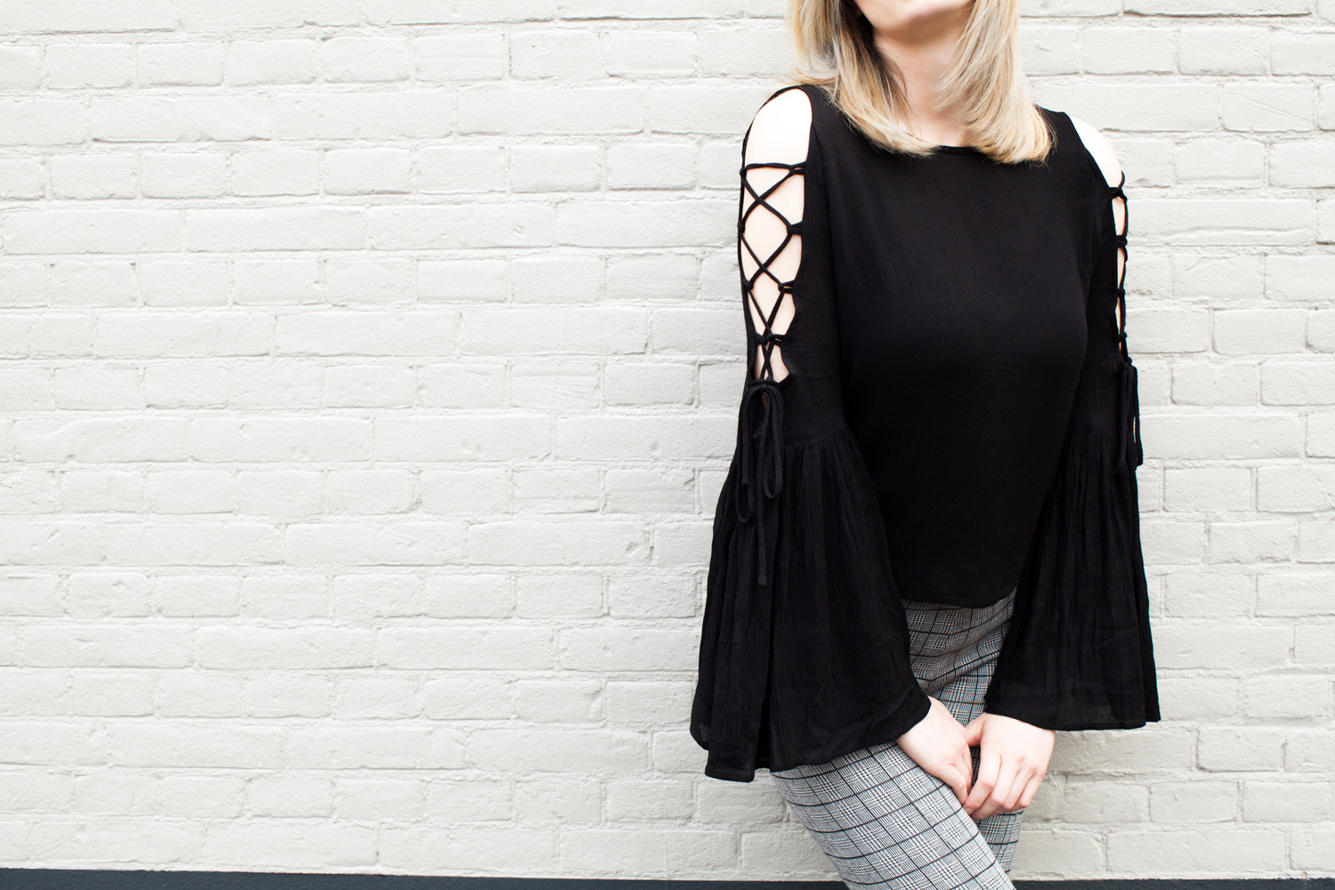 Black lace up open shoulder top with bell sleeves