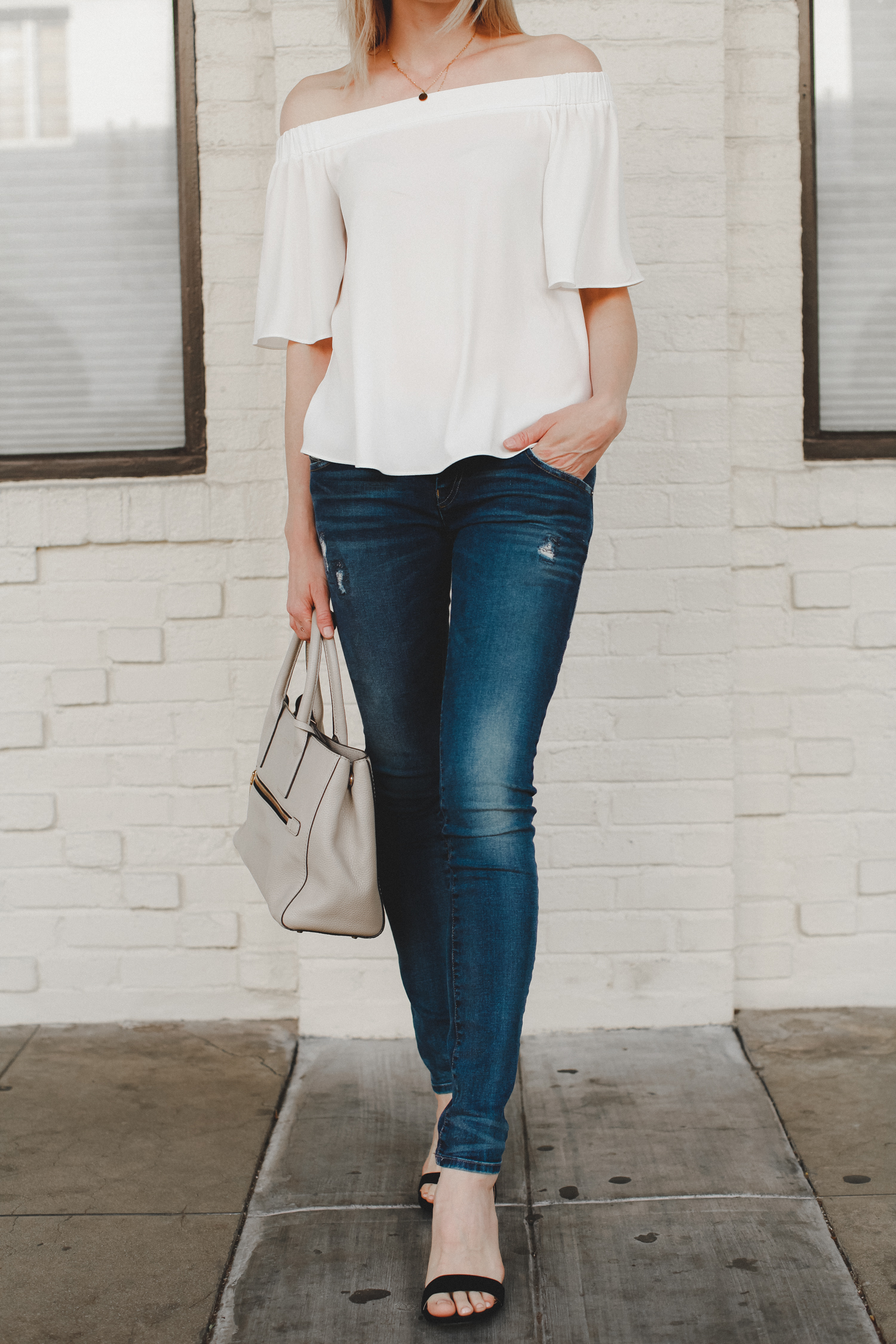 White off the shoulder top and denim