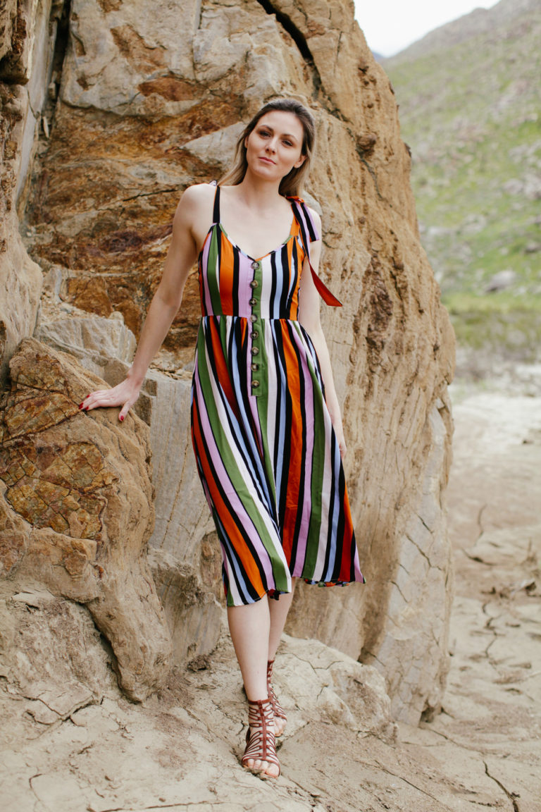 5 Casual Striped Summer Midi Dresses to Wear this Season featured by top US fashion blog, Tea Cups & Tulips: image of a woman wearing a ASOS striped midi dress