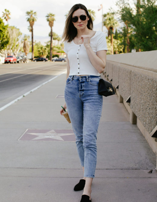 How to wear mom jeans, styling tips featured by top US fashion blog, Tea Cups & Tulips: image of a woman wearing H&M high waisted mom jeans, H&M ribbed top, A New Day pointy mules, Fulra bag, Amazon SOJOS aviator sunglasses and Amazon pearl hair clip.