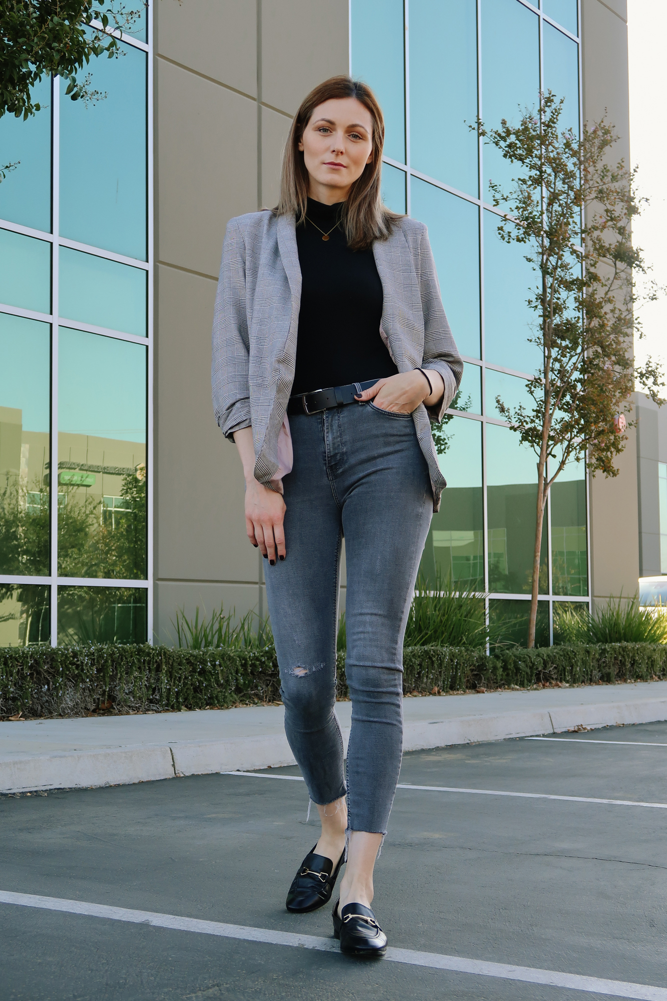 Casual outfit with a plaid blazer | Easy Casual Outfits To Try Right Now by popular California fashion blog, Tea Cups and Tulips: image of a woman outside wearing a SheIn Shawl Collar Pocket Patched Plaid Blazer, Amazon Happiness Boutique Circle Necklace, and Zara ZW PREMIUM SKINNY JEANS IN ARCTIC GRAY.