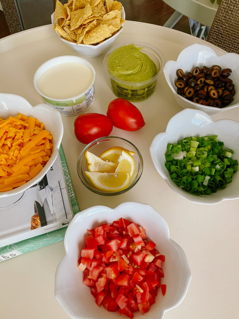 Kris Jenner's Layered Guacamole Recipe featured by top LA lifestyle blogger, Tea Cups & Tulips.